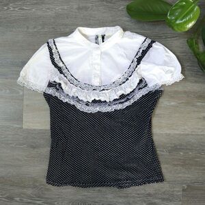 Coquette blue and white polka dot blouse with lace detail